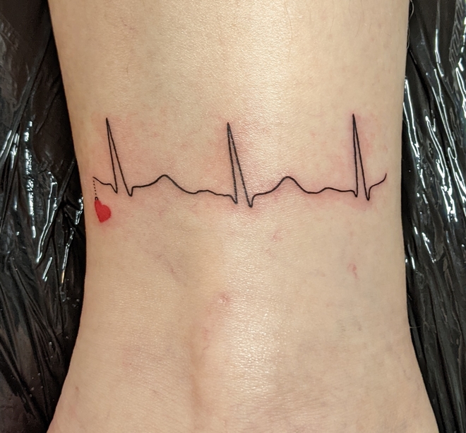 sein Herzschlag als Tattoo